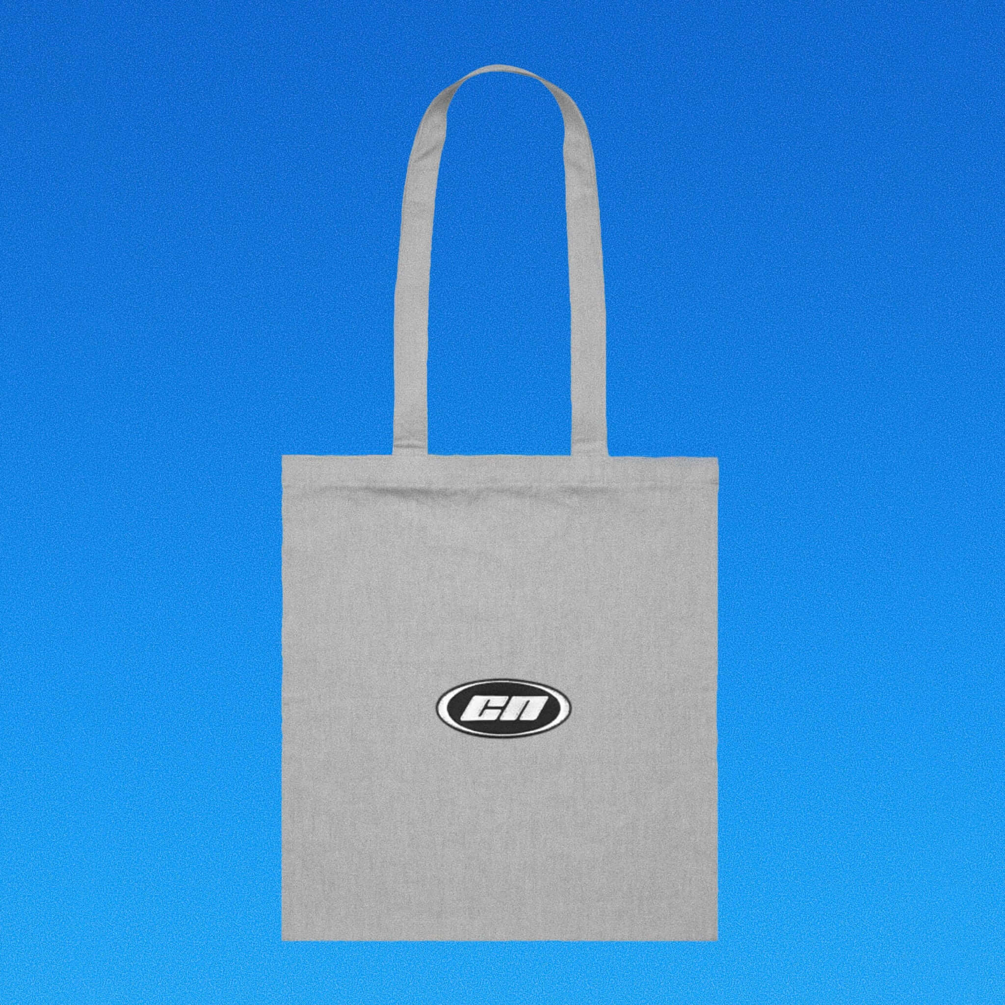 Gray tote bag with a logo on a blue background